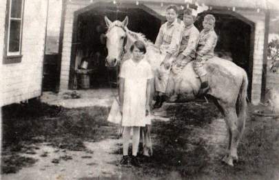 Eunice, Perry, Gene, Ralph on Old Nellie --  J.J.P. & Ruth  Hamilton's children Circa 1932